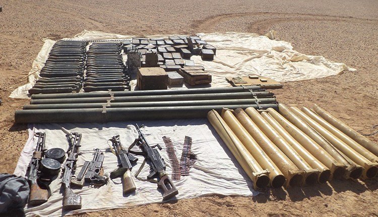 Algeria- large scale (and interesting) weapons cache discovered in Adrar (Mali border) including: - 1 PK - 2 RPDs -1 AK  - 1 MAT-49 (.) - 50 82mm mortar shells (standardized-improvised) - 14 improvised 120mm rocket launchers (varying lengths)  - Assorted ammo