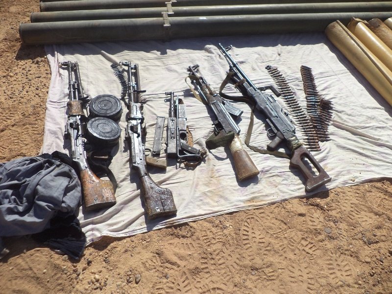 Algeria- large scale (and interesting) weapons cache discovered in Adrar (Mali border) including: - 1 PK - 2 RPDs -1 AK  - 1 MAT-49 (.) - 50 82mm mortar shells (standardized-improvised) - 14 improvised 120mm rocket launchers (varying lengths)  - Assorted ammo