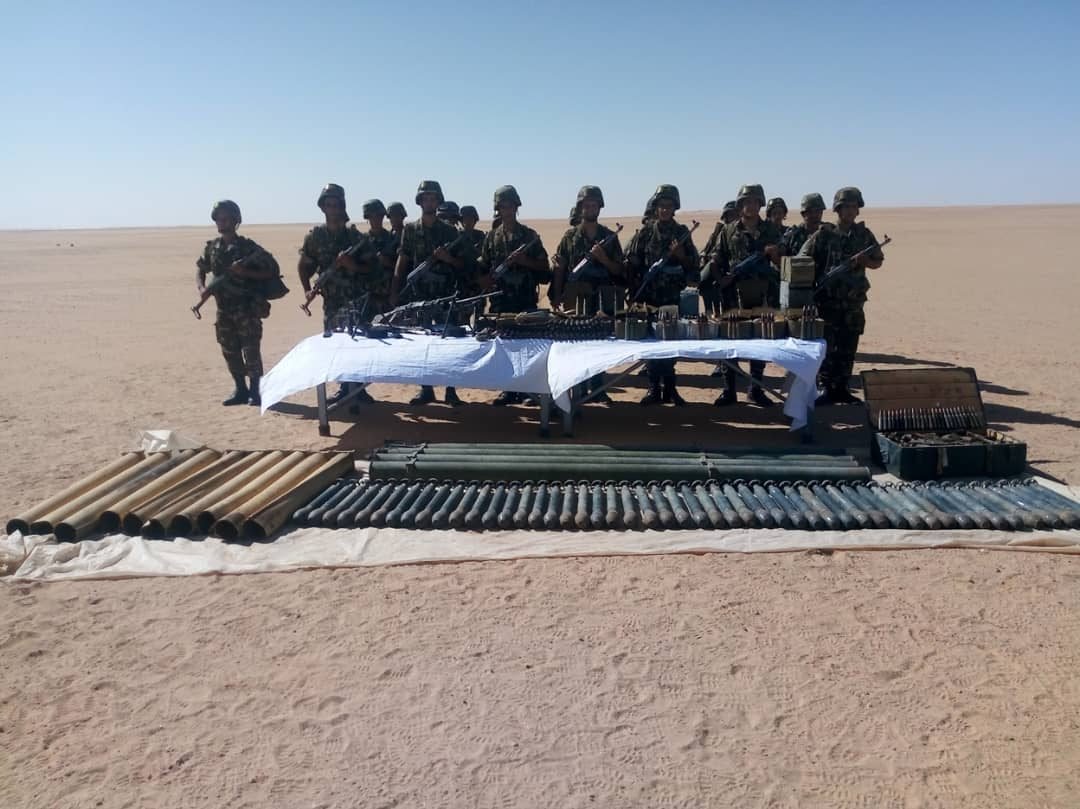 Algeria- large scale (and interesting) weapons cache discovered in Adrar (Mali border) including: - 1 PK - 2 RPDs -1 AK  - 1 MAT-49 (.) - 50 82mm mortar shells (standardized-improvised) - 14 improvised 120mm rocket launchers (varying lengths)  - Assorted ammo