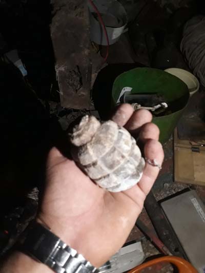 Algeria- MDN photos from militants' hideout discovered in Constantine, including a Beretta 950 and a whole bunch of IEDs, grenades & other equipment