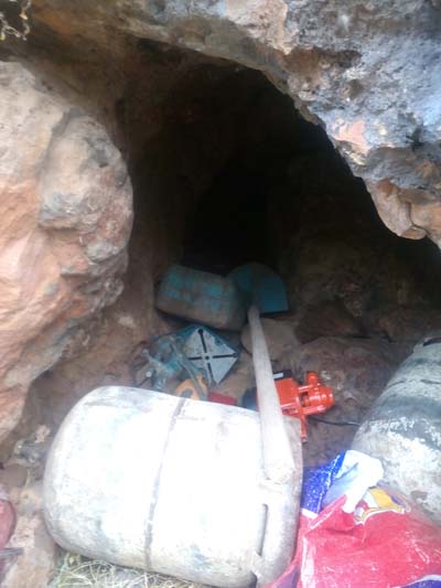 Algeria- MDN photos from militants' hideout discovered in Constantine, including a Beretta 950 and a whole bunch of IEDs, grenades & other equipment